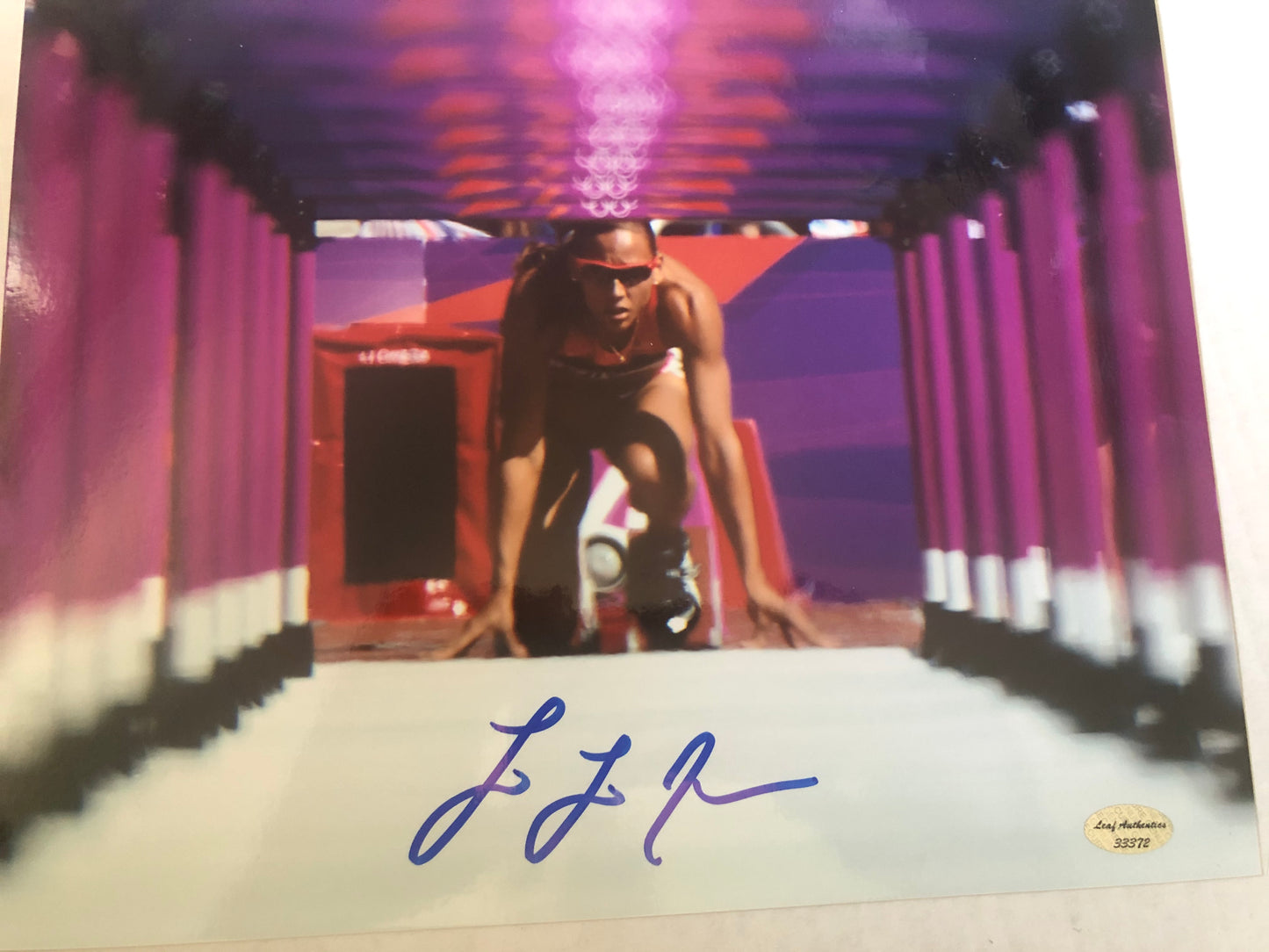 LoLo Jones signed 8x10 w/ Leaf Cert. USA Track
