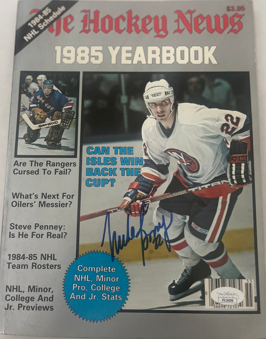 1985 HOCKEY NEWS YEARBOOK  SIGNED BY MIKE BOSSY  W/JSA   DECEASED