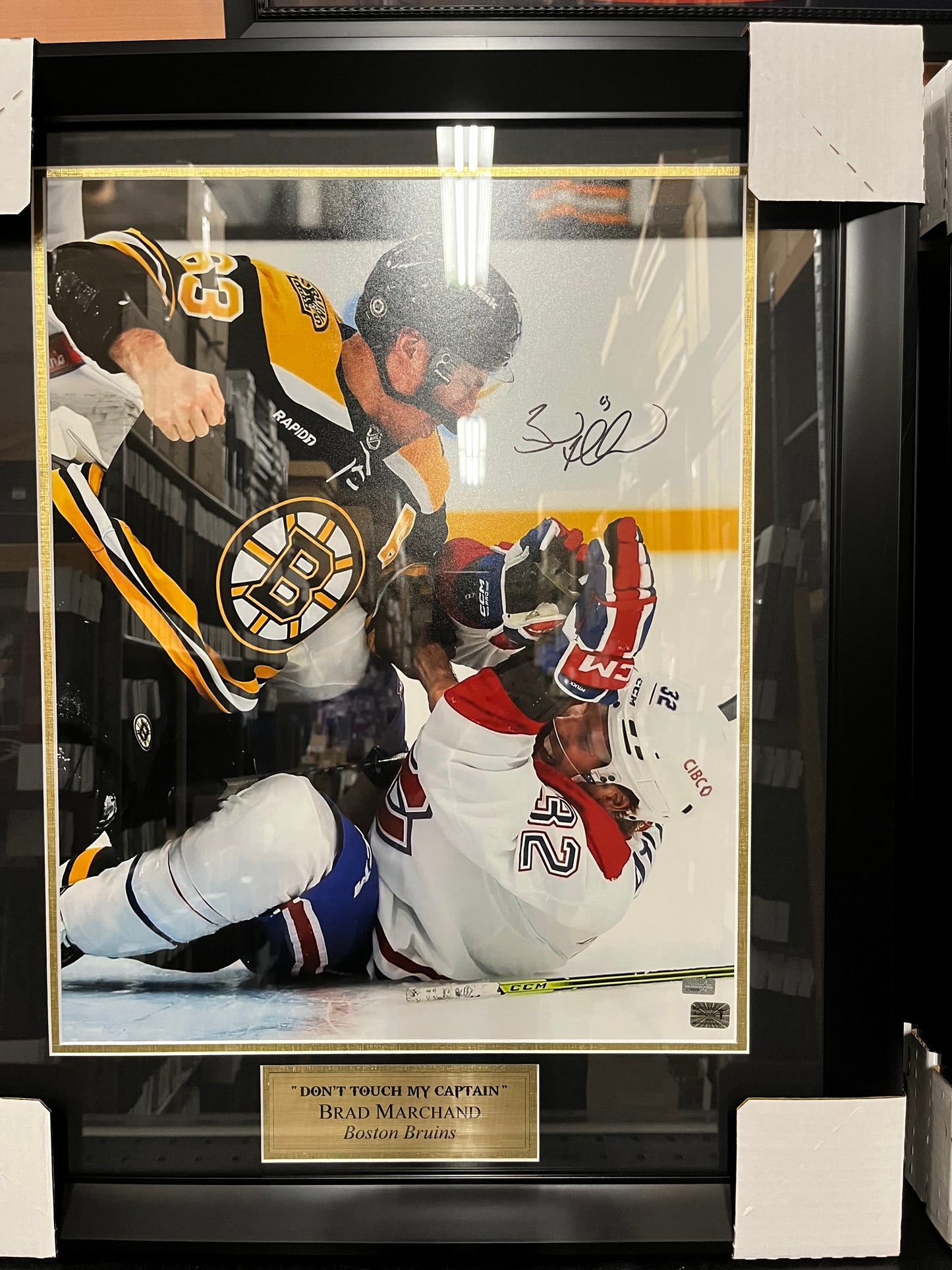 Brad Marchand signed 16x20 "Montreal Fight"  Profressionally mattted and framed to 22x24
