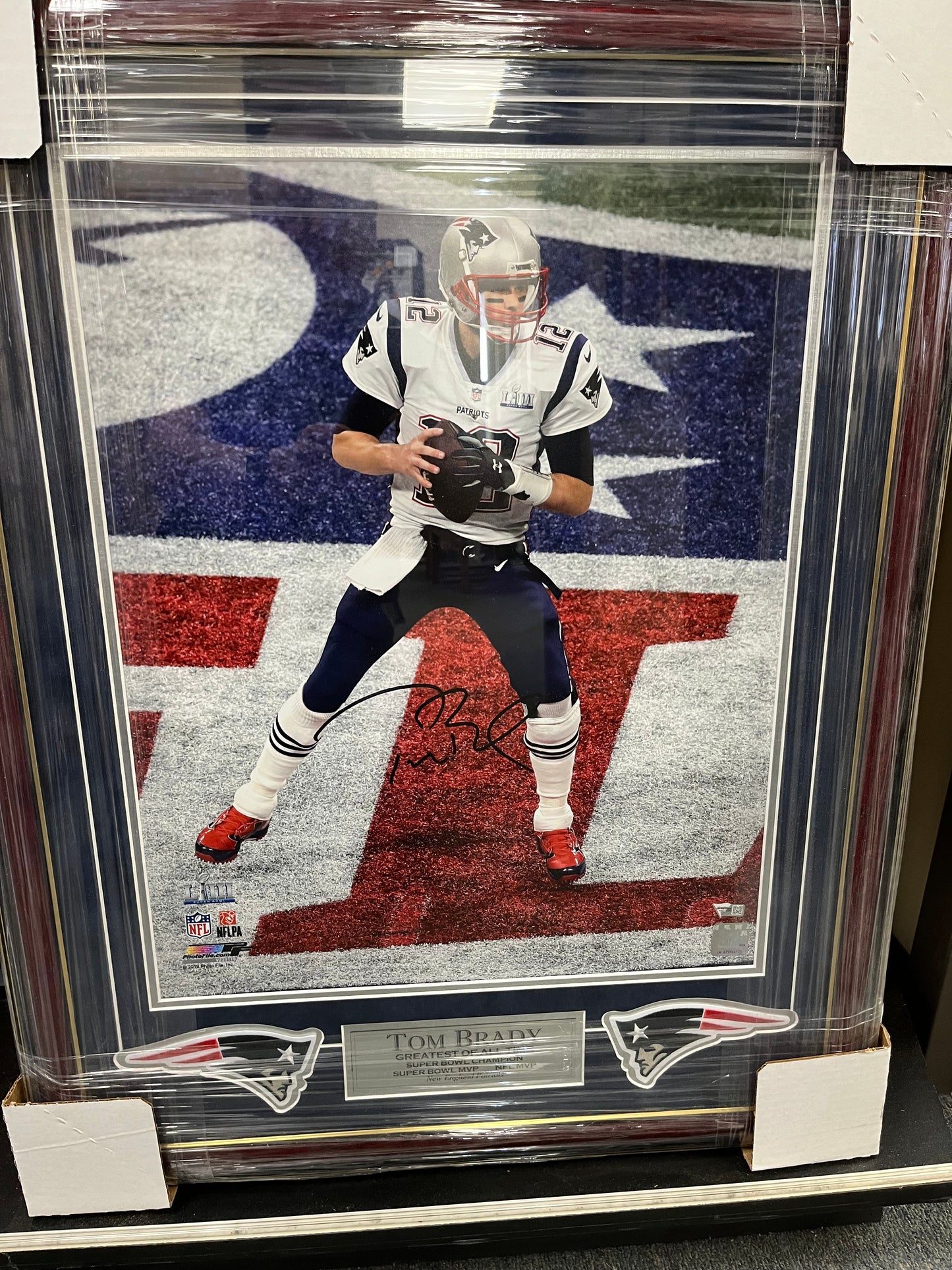 Tom Brady signed 16x20  "NFL LOGO" Profressionally mattted and framed to 22x24